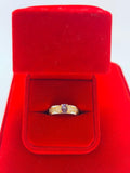Anillo de Tanzanita en corte Oval acabado dorado con zircones