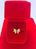 Anillo de Tanzanita en corte Oval diseño mariposa