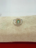 Anillo de esmeralda corte oval dorado