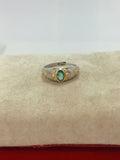 Anillo de esmeralda corte oval diseño sol