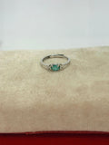 Anillo de esmeralda corte oval
