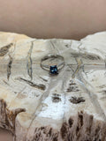 Anillo de topacio London blue corte cuadrado
